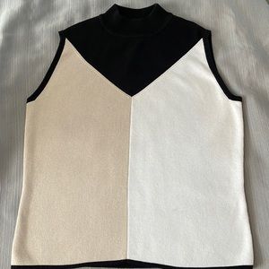 Designers Originals sweater size medium. Sweater turtleneck and sleeveless .